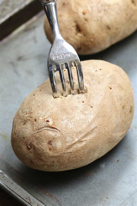 Should you wrap potatoes in foil when baking them?